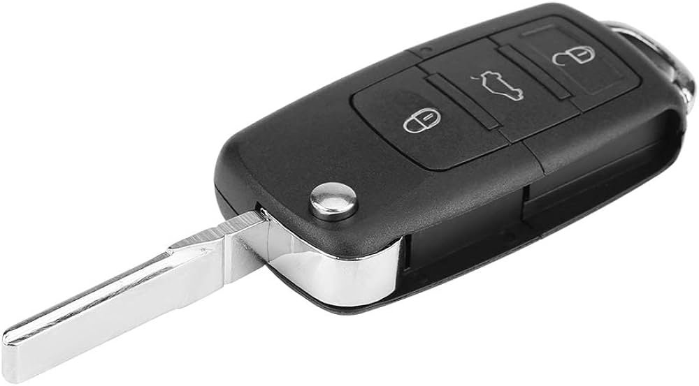 Dónde puedo conseguir llaves de auto con chip a domicilio en México 1 llaves de auto con chip sobre una mesa