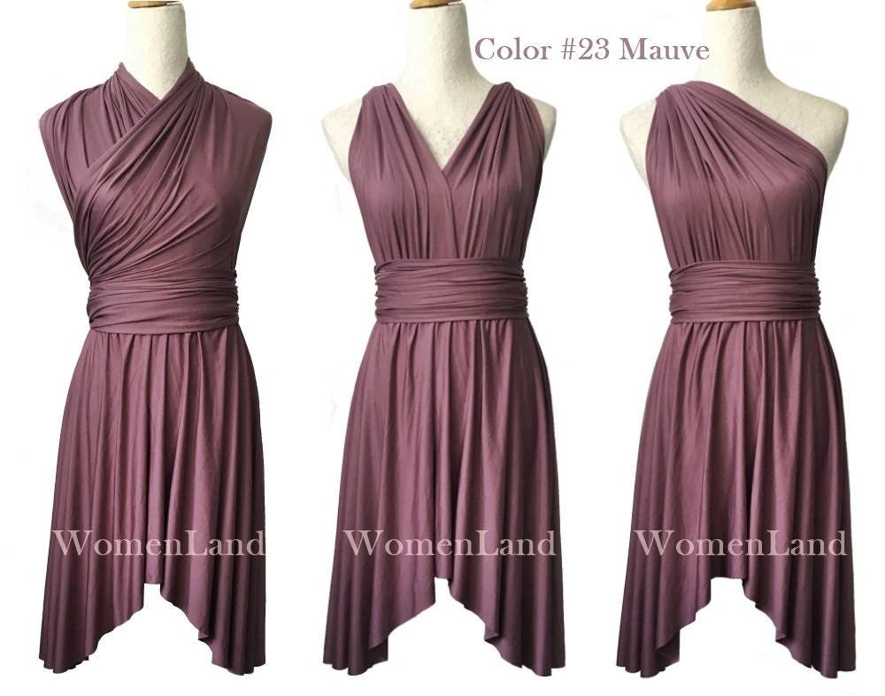 Cuáles son las características del vestido wrap de Diane von Furstenberg 1 vestido wrap elegante sobre fondo neutro